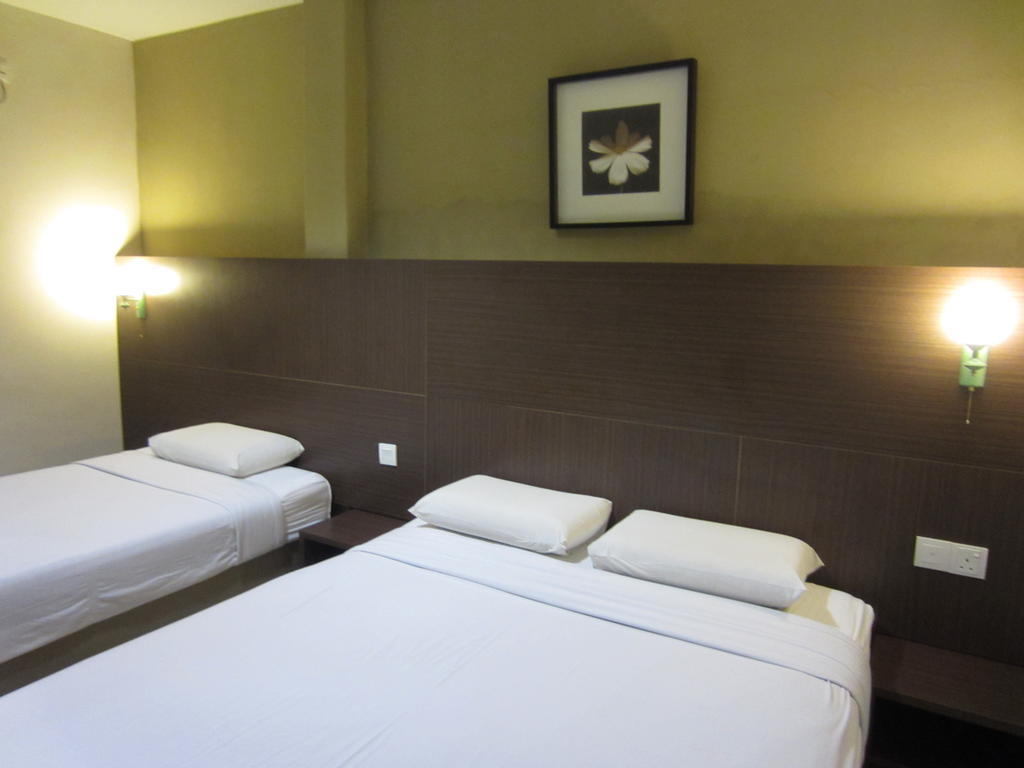 Radiant Hotel Sitiawan Habitación foto
